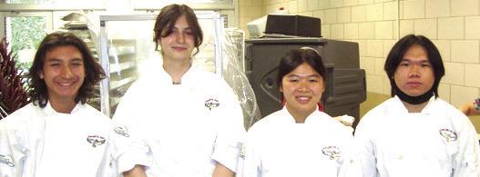 A few students at Chalmette High’s culinary program help serve several hundred at the big reflection breakfast. Success is just around the corner for the culinary students at a fine New Orleans restaurant.