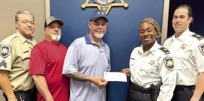 DARE Program Receives Donation from Kids Fishing Rodeo