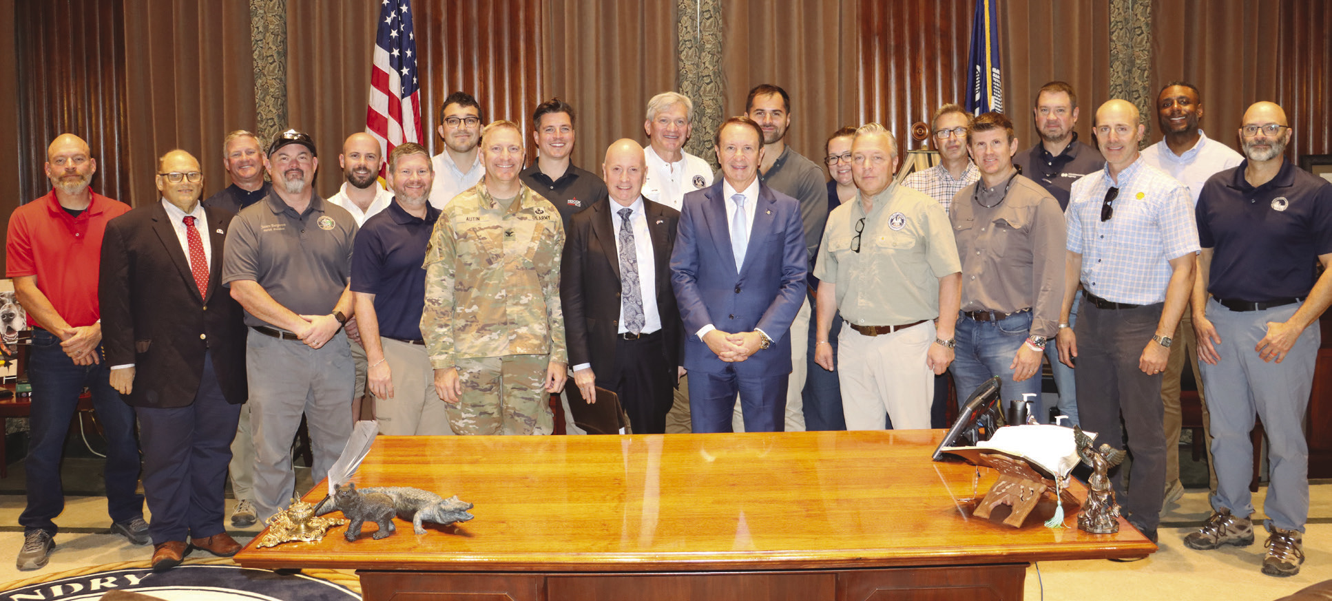 State Rep. Mike Bayham (second from left) joined Governor Je Landry and Insurance Commissioner Tim Temple in meeting with London-based reinsurance executives to highlight Louisiana's . ood resiliency e orts and build con. dence in the state's ability to withstand catastrophic hurricanes.