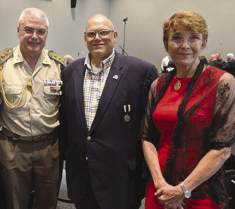 Louisiana State Rep. Mike Bayham pictured with Honorary Consul General for Spain, Maria Page and Colonel Fernando Puebla of the Spanish Army.