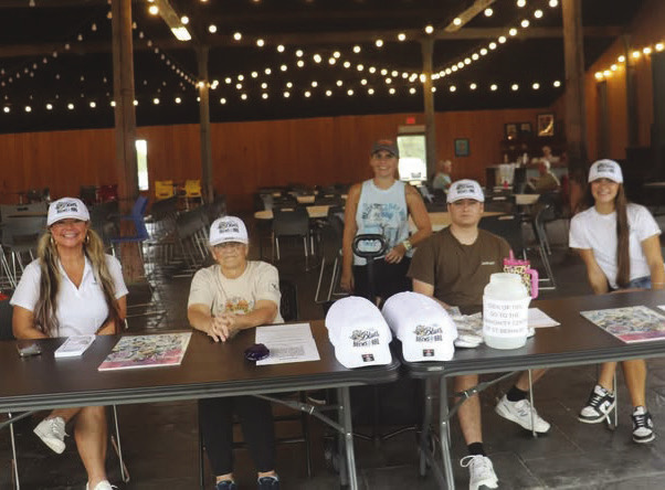 Volunteers help run Blues, Brews, and BBQ.