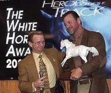 Louis Pomes receives a national award for animal welfare after Hurricane Katrina.