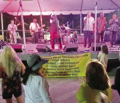 Rockin Doopsie entertaining the crowd at the Los Isleños Fiesta on Saturday evening.