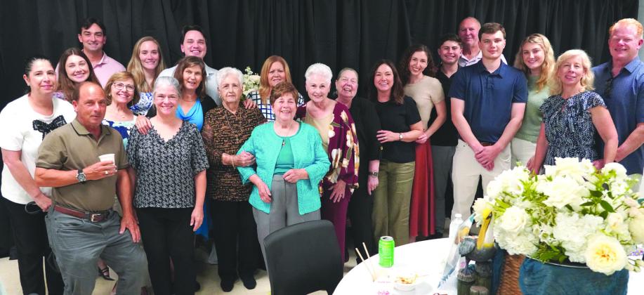 Retired Nunez Community College Culinary Instructor Chef Ruth Varisco, center, in blue, poses for a picture with her family during A Seat at Chef Ruth’s Table. Proceeds from the retirement party and fundraiser will go toward the newly-established Chef Ruth Varisco Scholarship Fund. Chef Ruth was a culinary instructor at Nunez for more than 30 years.