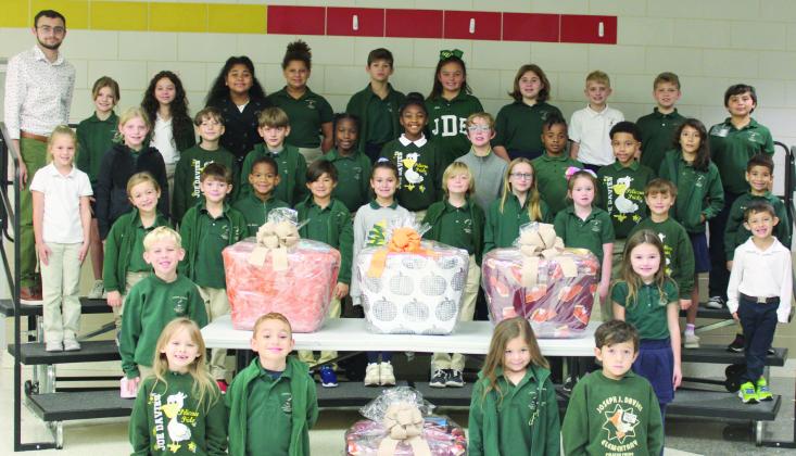 The Joseph Davies Elementary Pelicans hosted a Thanksgiving Food Drive from October 13 to November 10. The students collected over 500 non-perishable food items and were able to make 13 Thanksgiving food baskets for needy families in the Davies community. Turkeys were also donated. Each family received a turkey and a basket filled with non-perishable food items. We are so thankful and proud of our Davies Pelicans for making this food drive such a huge success.