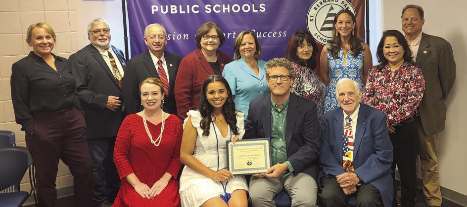 Abadie with Dr. Brian Beabout (front row, center) are pictured with the members of the St. Bernard School Board.