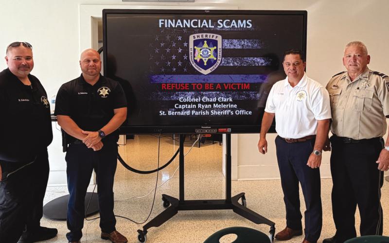 Col. Chad Clark, commander of the St. Bernard Parish Sheri 's O ce Criminal Investigations Bureau, third from left, and Assistant Commander Capt. Ryan Melerine, second from left, speak to members of the Old Arabi Neighborhood Association during a recent community meeting at the Maumus Center, where they share information about current scams targeting residents and how to avoid becoming victims. Also pictured are Detective Lt. Robert Garofalo, far left, and Lt. Eric Eilers, far right.