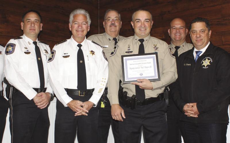 St. Bernard Sheri's Oce Dep. Gabriel "Trip" Roques III receives the prestigious Kiwanis Club of St. Bernard Sammie Catalanotto LifeSaver Award. At the award ceremony are, from left: Col. Daniel Bostic Jr., Capt. Leander Morgan, Sheri James Pohlmann, Sgt. Mitchell Perkins, Dep. Roques, Sgt. Matthew Chiasson, Col. Chad Clark and Capt. Ryan Melerine.
