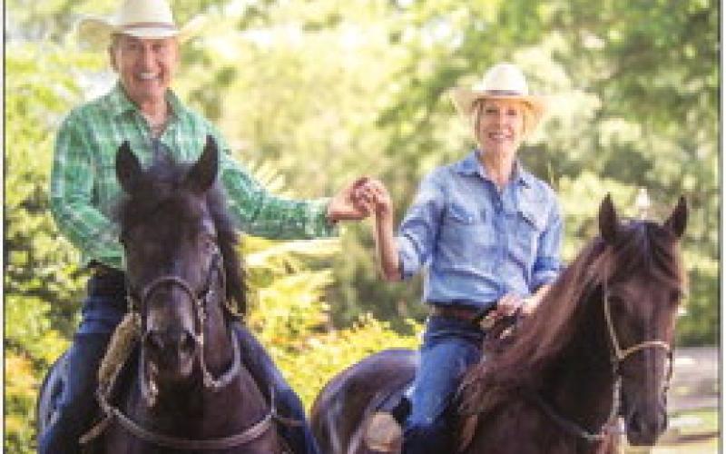 Sidney Torres and Roberta Burns riding their Paso Fino horses on the levee along the Mississippi River. Riding was a favorite pastime.