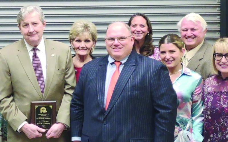 Local Republican officials and activists are pictured with US Senator John Kennedy.