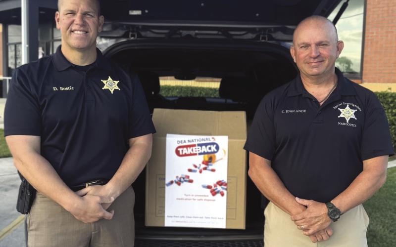 Col. Daniel Bostic Jr., commander of the Special Investigations Division, left, and Lt. Cliord "Chip" Englande of the SID Narcotics Unit, participated in the National Prescription Drug Take-Back Day held Saturday, Oct. 25 where the Sheri's Oce collected 55 pounds of