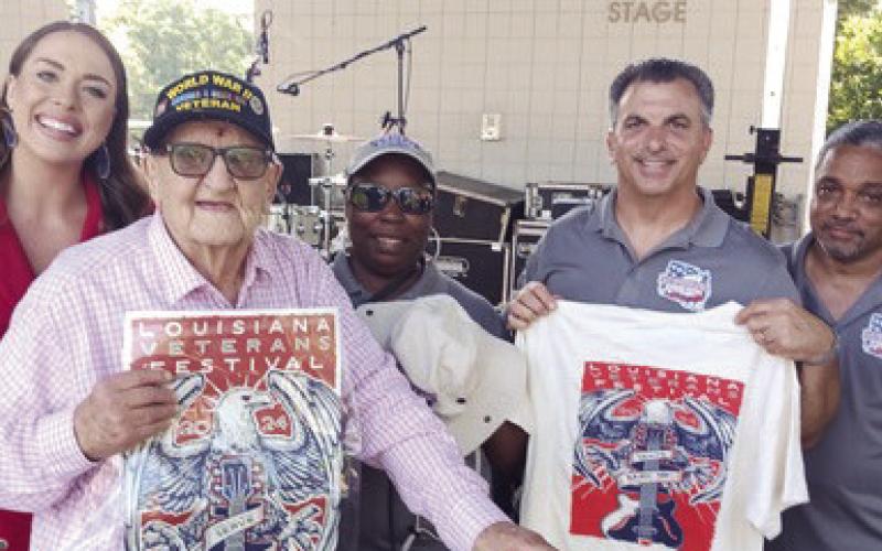 The organizers of the Louisiana Veterans Fest honored Eddie Tresch with a few gifts of the festival.