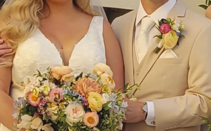 Congrats to the newlyweds, St. Bernard residents Kelsi and Glenn Davis!
