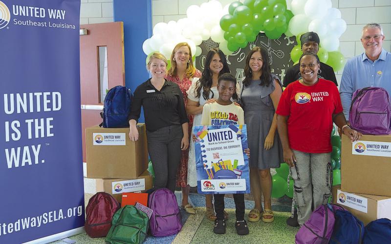 Front Row Left to Right: Jace Taylor, LoToya Ratcli . Second Row Left to Right: Brittany Elder, Michelle Clarke Payne, Arabi Elementary Assistant Principal Magen Arabie, Arabi Elementary Principal Andrea Woodward, Jayron Taylor, UWSELA President Michael Williamson