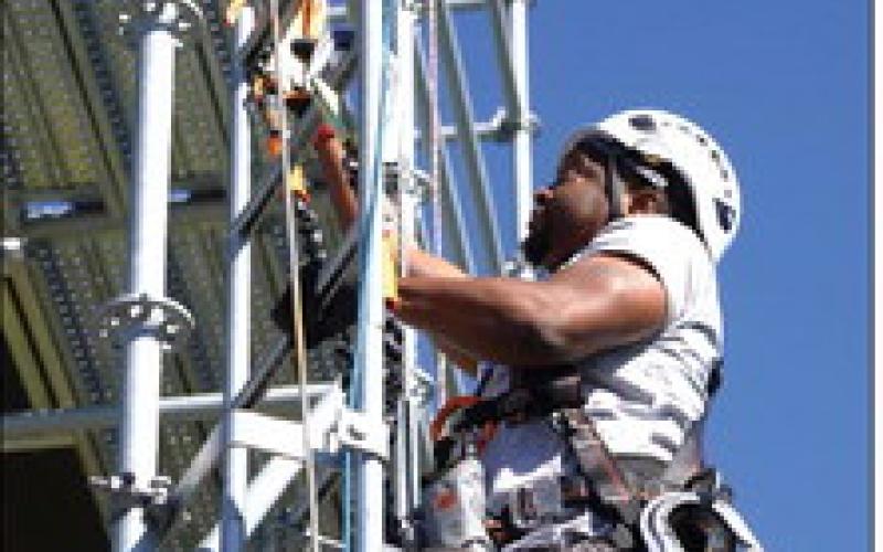 Pictured, Wind Energy Technology student Donald Lofton of Slidell practices safety for working at heights at Nunez's training facility.
