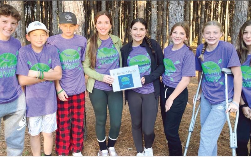 On Nov. 1 and Nov. 2, seventh graders from Trist, Andrew Jackson, and OLPS participated in the Southeast Region 4-H Challenge Camp. Campers had a great time outdoors doing team building activities, making their own lunch, canoeing, and navigating obstacles. Pictured, from left: London White-Stein, Preston Senez, Jack Bazile, 4-H Agent Gabrielle Guerra, Kathryn Dinet, Isla Caruso, Kayden Jackson, and Jaycee Cardon.