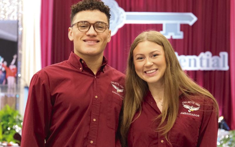Above: The St. Bernard School Board Hosted its Annual Day of Reflection Celebration. Henry Rodriguez III, Sean Warner, Kelly Le-Bowman, Vice President Katherine Lemoine, President Diana Dysart, Superintendent Doris Voitier, Carly Creason, Millie Harris, and Rosiland White attended. Right: Chalmette High Seniors, Norman Morales and Alexa Sullivan, served as narrators for the morning's program.