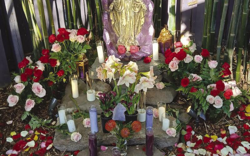 The statue of the Blessed Virgin Mary that was blessed this past Saturday. For those who attended, it was a renewal of faith. The beautiful rose decorations were arranged by Myrna Hinyub and what a talent she was at the event with her many home cooked dishes served.
