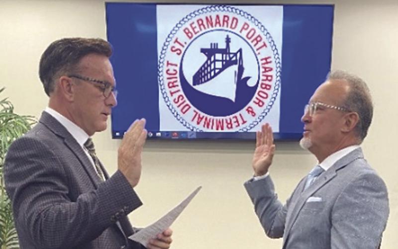 Perry M. Nicosia, St. Bernard Parish’s District Attorney, administers the Oath of Office to Ronald Alonzo Jr., now the port’s Secretary in its Board of Commissioners.