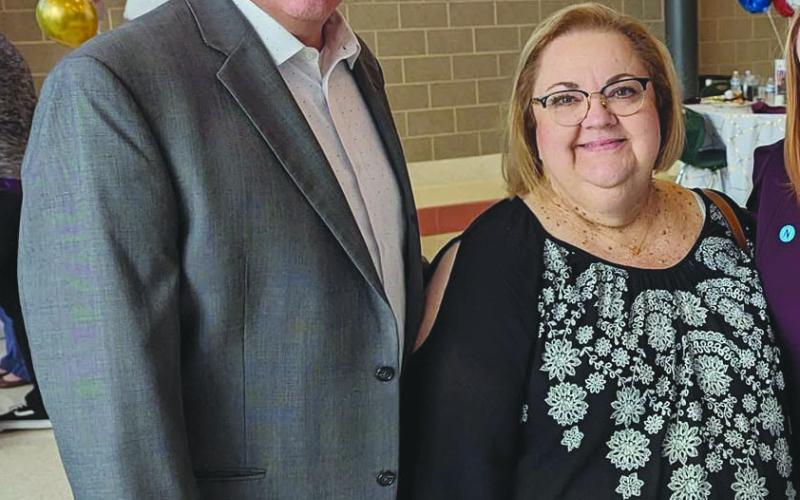 Cindy Maag (right) with fellow Board Member for the St. Bernard Parish Hospital Service District, Ray Lauga (left).