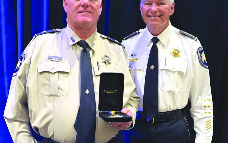 St. Bernard Sheri James Pohlmann, right, stands with Detective Sgt. Kenneth Sierra during the 41st Annual Crimestoppers of Greater New Orleans Awards Luncheon, where Sgt. Sierra was recognized as one of the region's 2026 Deputies of the Year.
