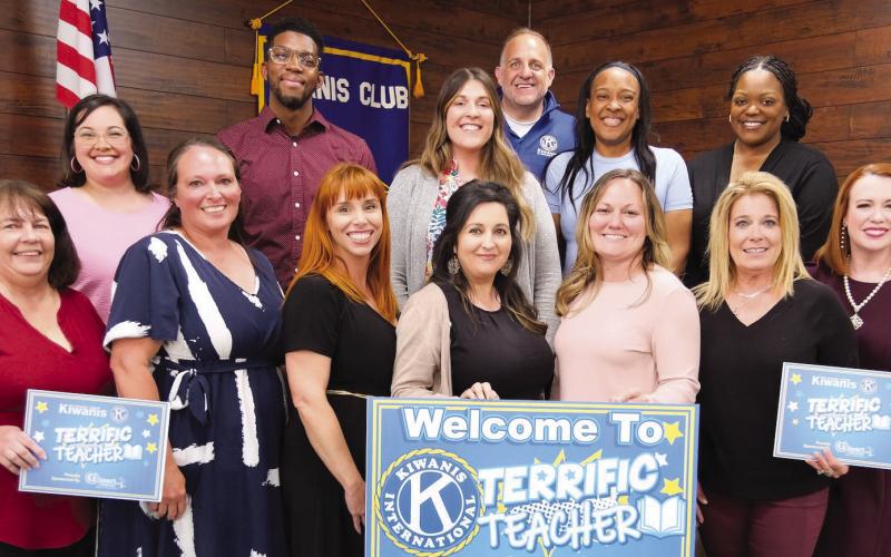 St. Bernard Parish Terri. c Teachers 2025, Left to right: Front Row- Candice Perez, Lesley Campo, Jennifer McCloskey, Monica Hentze, Gabrielle Smith, Karen Braquet-Sandrock, School Board President Katherine Lemoine. Back Row- Amanda Falgout, Justin Reed, Caroline Miller, Kiwanis Program Coordinator Kevin Ho man, Aleshia Riley, Jawyan Banks