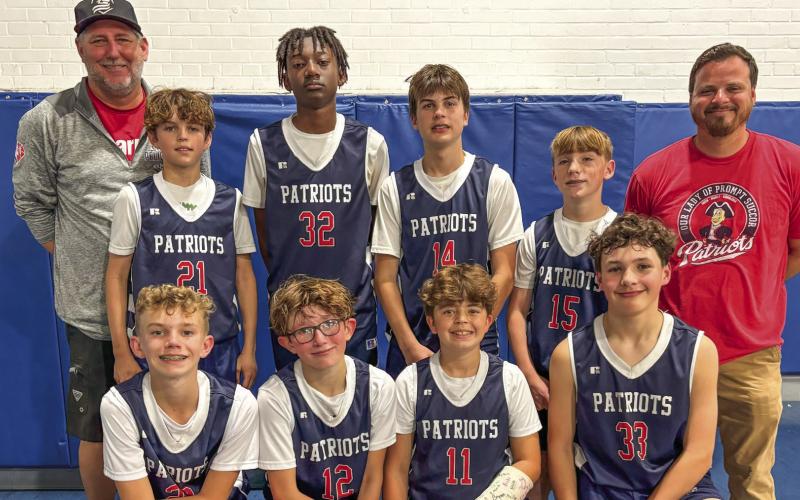 The Patriots from Our Lady of Prompt Succor Catholic School in Chalmette won the City Championship for senior boys basketball in the Catholic School Athletic League Monday. Shown in the front row, from left: Michael Warden, Beckett Christoffer, Colby Duncan, and Liam Perez. In the back row, from left: Coach Terry Christoffer, Britt DeBlonde, Jai Williams, Brayden Mitchell, Pacey DeBlonde, and Coach Dirck Duncan. Mrs. Scheuermann is the team moderator.