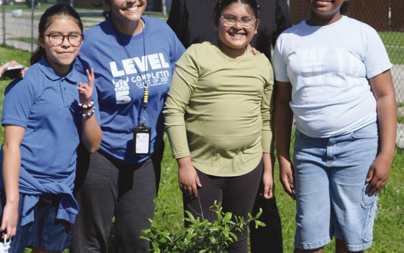 From left: Arianny Sanchez, Ms. Alecia Desselle, Emely Herrera, Mr. Rufus Little, Destiny Johnson.