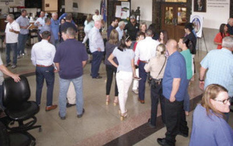 The lobby of the St. Bernard Courthouse filled with politicians and citizens for the close of qualifying.