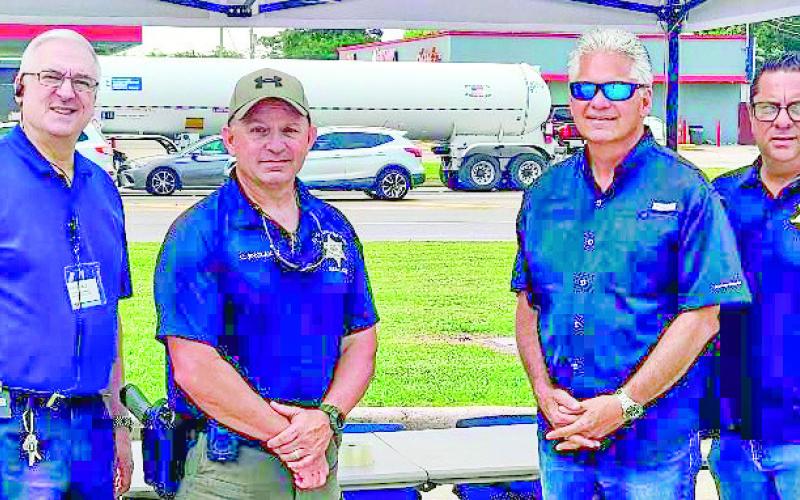The St. Bernard Sheriff’s Office held a Drug Take-Back Day on April 27 at Walgreens at the corner of Judge Perez Drive and Paris Road in Chalmette. From left, are: Walgreens Manager Kevin Krul, Lt. Chip Englande of the Special Investigations Division Narcotics Unit, Sheriff James Pohlmann, and Col. Chad Clark, chief of detectives and commander of the Criminal Investigations Bureau.