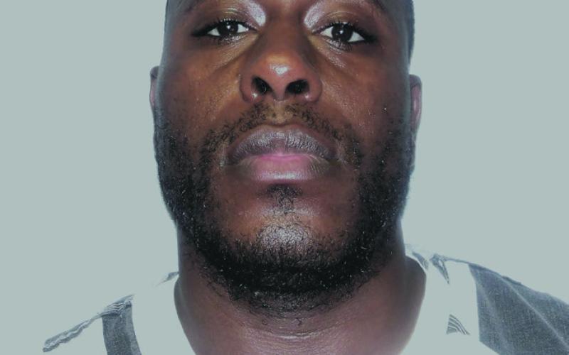 O'Neil Davis, 33, was booked on multiple narcotics and weapons charges following a raid by St. Bernard Parish authorities.