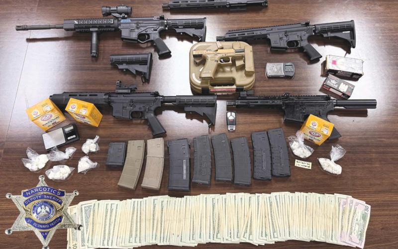 Authorities seized multiple . rearms-including four AR-style ri. es and a stolen Glock 9mm-along with crack cocaine, fentanyl, drug paraphernalia, and over $3,300 in cash during the investigation that led to O'Neil Davis' arrest.
