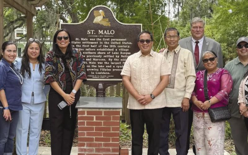 A delegation from the Philippine Consulate in Houston visits the St. Malo historical marker that notes where the . rst Filipinos settled in the United States.
