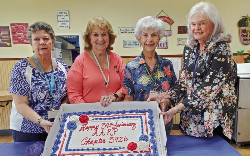 On Saturday, June 22, AARP Chapter 3926 celebrated it's 39th year anniversary with a luncheon for all of it's members. Officers pictured, from left, are Glenda Fedele (Treasurer), Leona Galley (President), Carolyn Constance (Secretary) and Terry Heidel (Vice President). The club sends thanks to Breaux Mart for their beautiful anniversary cake.