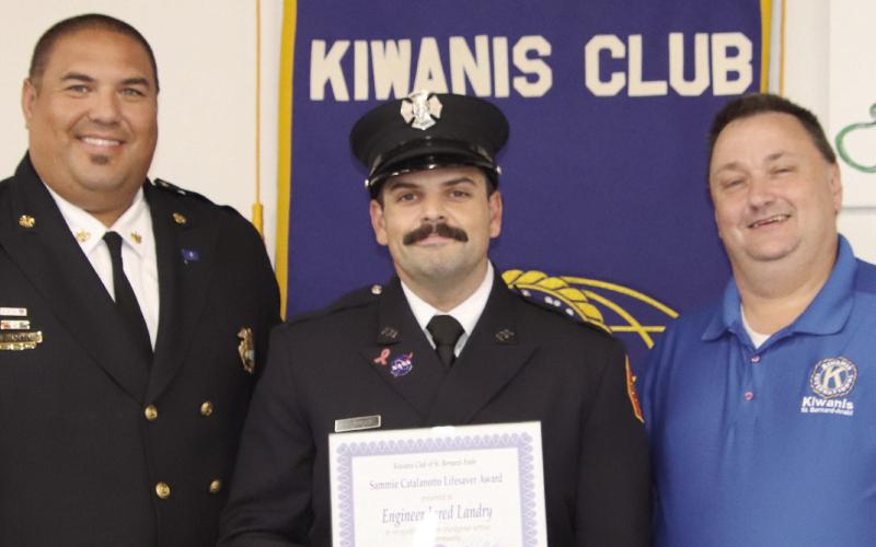 Pictured, from left: St. Bernard Fire Chief Earl Borden, SBFD Engineer Jared Landry, and Kiwanis Program Director Ellis Fortinberry
