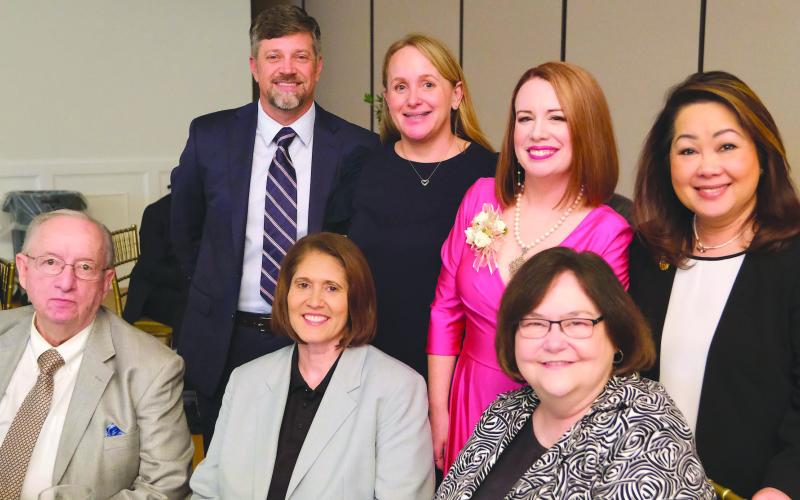 Front Row Left to Right: School Board Member Joseph Long, Deputy Superintendent Mary Lumetta, Superintendent Doris Voitier, Second Row: Director of School Operations Jason Dewey, School Board Member Carly Creason, Woman of the Year Katherine Lemoine, School Board Member Kelly Le-Bowman.