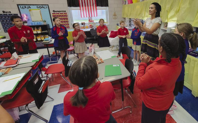 Eleanor Frederic-Humphrey teaches at Gauthier Elementary as part of the Goat in the Road Play / Write Program.