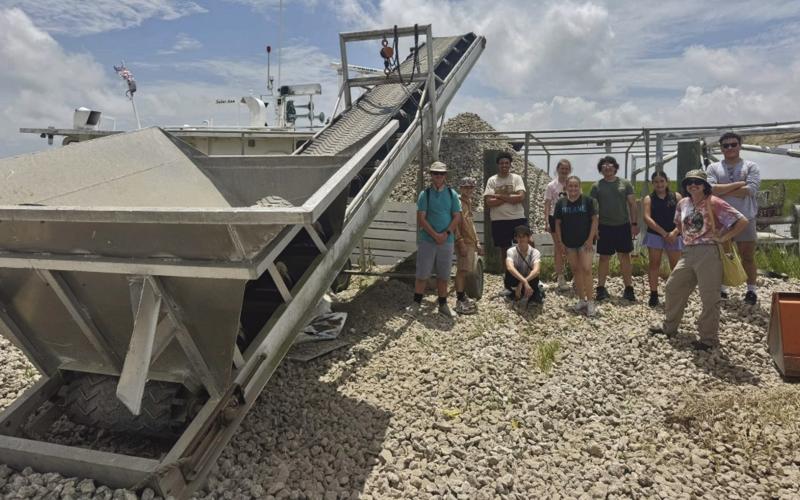 Campers at the Delta Marina to explore the oyster harvesting industry. Pictured left to right: Grin Touchet, Joseph Suberville, Kristion Thomas, Sara Wingrove, Kelsey Hambrice, Tatiana Cabrera, Christian Miller, Kathryn Dinet, Plaquemines Parish 4-H Agent Lou Duplantier, and Norman Morales.