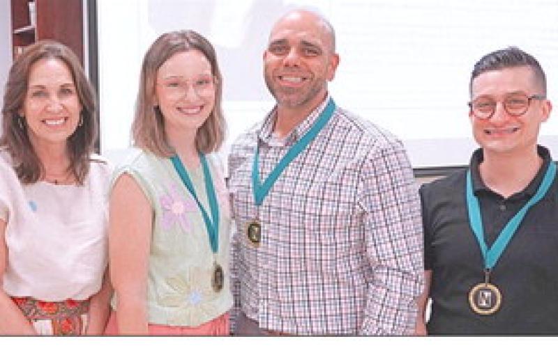 Three of Nunez Community College's top instructors were recognized April 30 during the college's annual Excellence In Teaching Luncheon. Pictured from left are Nunez Chancellor Tina Tinney with nominees Melanie Schmill, Steve Baiamonte and Charles Miller.