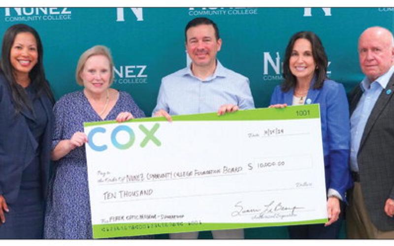 Representatives from Cox Communications attended Nunez Community College’s Scholarship Breakfast Oct. 25 to present a donation of $10,000 for Nunez’s Fiber Optics program. Pictured from left are Sunni LeBeouf, Market Vice President of Cox Communications, Dr. Julie Rexford, Director of Nunez’s STEAM Division, Chad Adams, Human Resources Business Partner for Cox, Dr. Tina Tinney, Nunez Chancellor, and Cliff England, Chair of the Nunez Foundation Board of Directors.