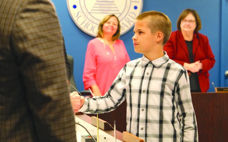 School Board Recognizes Academic Games Teams And Gives $15,000 Donation