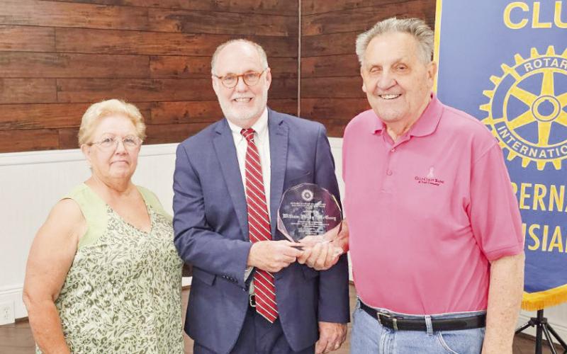 The club presented its Rotarian of the year award to St. Bernard Parish Judge William McGoey for outstanding community Service to the St. Bernard Rotary Club. Pictured, from left: Club President Brenda Breakfield, Judge McGoey and long-time Rotarian Gus Riess (Market President for Gulf Coast Bank &amp;amp; Trust).