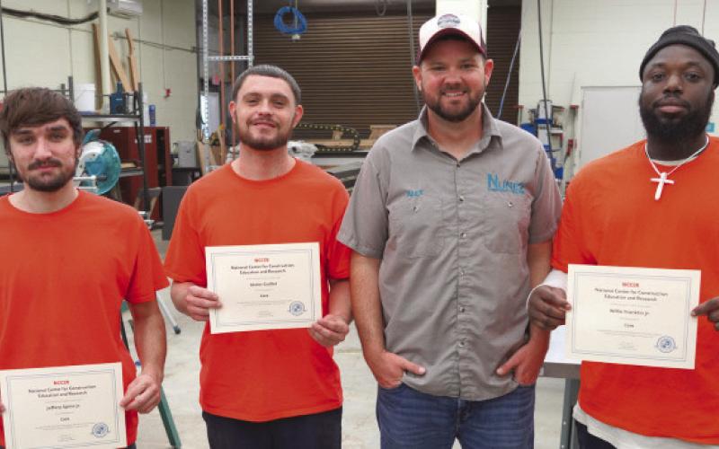 Nunez Community College recently began oering industry-based certificate training to inmates in the St. Bernard Parish and Plaquemines Parish Jails on a regular basis after oering sporadic programs in the past. Pictured, trusties from the St. Bernard Parish Jail, with Nunez Instrumentation instructor Alex Mulvaney, received their NCCER Core basic construction certificates back in November 2023.