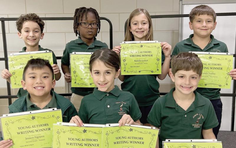 SECOND GRADE - Jensen Nguyen, Sydney Bodden, Braxton Cheramie, Scott Schofield, Devin Spriggins, Kamille Grosch and Caleb Dudley.