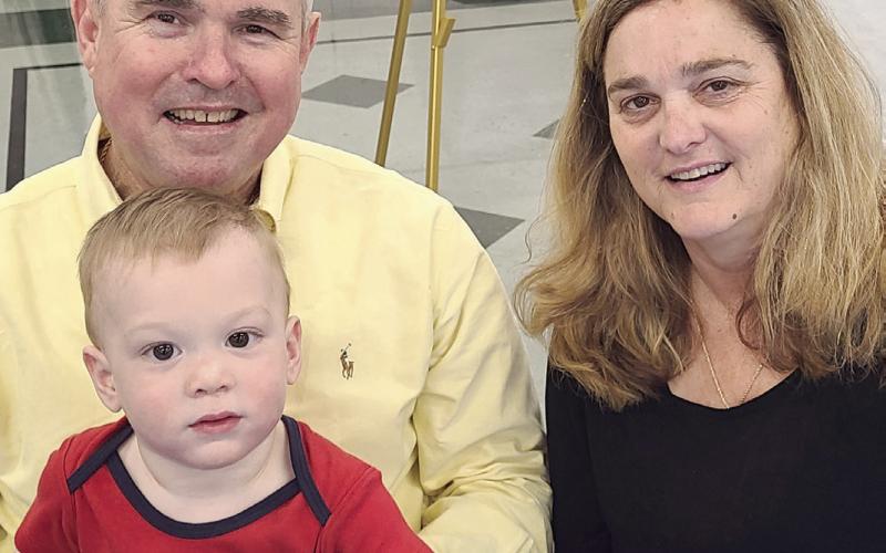 Mike and Alice Ginart pose for a pic with their grandson at the Terrific Teachers celebration, sponsored by Ginart &amp;amp; Associates.
