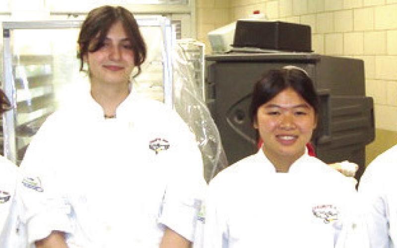 A few students at Chalmette High’s culinary program help serve several hundred at the big reflection breakfast. Success is just around the corner for the culinary students at a fine New Orleans restaurant.