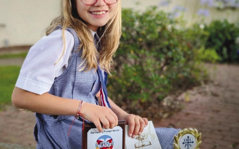 Catherine Robin, a 9-year-old student from Our Lady of Prompt Succor School in Chalmette, broke the national record for points earned in a single school year in the Accelerated Reader program after reading more than 600 books in the third grade.