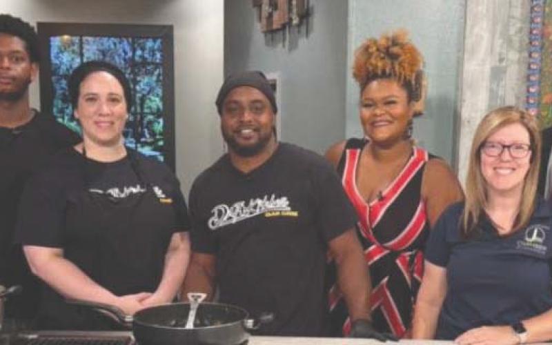Local restaurant owners of Dat Kitchen joined Chamber Executive Board Member and Shop Small Committee Chair, Jessica Reab of Brewster’s Restaurant, on WWL Channel 4 Morning News, Friday, July 18, to showcase Dat Kitchen’s House Burger — one of the featured specials during the 10-day Savor St. Bernard event.