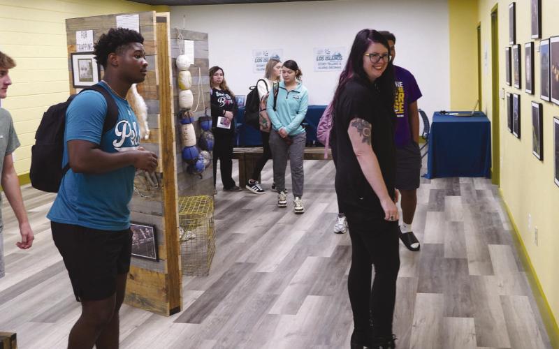 Nunez Community College opened its Los Isleños Historical Archive Aug. 27 with an open house for special invited guests. The archive is open and available to the public on the second floor of the Nunez Library. Pictured, Nunez instructor Taylor Amalfitano leads her class through the archive.