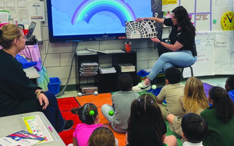 SBSO’s school liaison investigator Lt. Michelle Canepa shared a story with Arabi Elementary School students during Literacy Week.